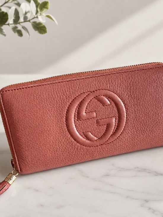 Gucci Handbags - Gucci terracotta Leather Zip-Around Wallet with Embossed GG